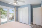 Main level queen bedroom has direct access to the deck
